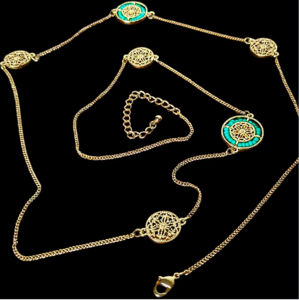 Green & gold tone necklace with medallion stations